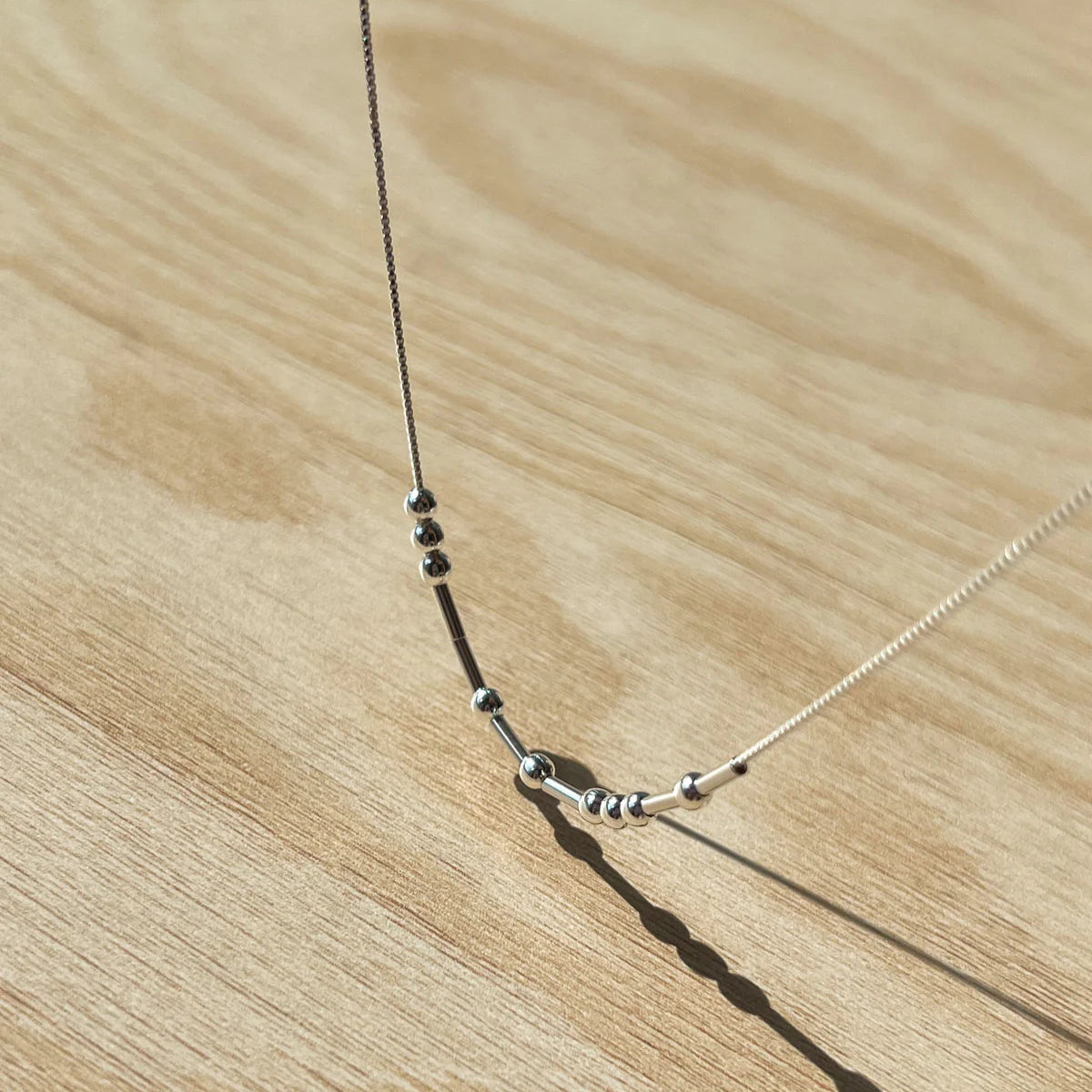 Gold Plated Morse Code Necklace, Focus on Detail